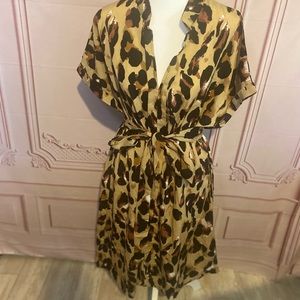 Casual lightweight pullover dress with belt.  Fits for a Large.  Never Worn